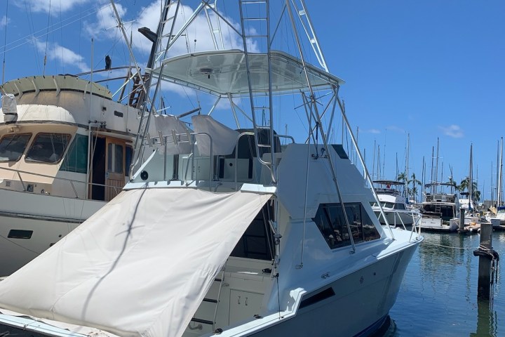 a boat is docked next to a body of water